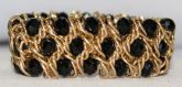 PULSEIRA CORRENTES DOURADA COM PONTOS PRETOS